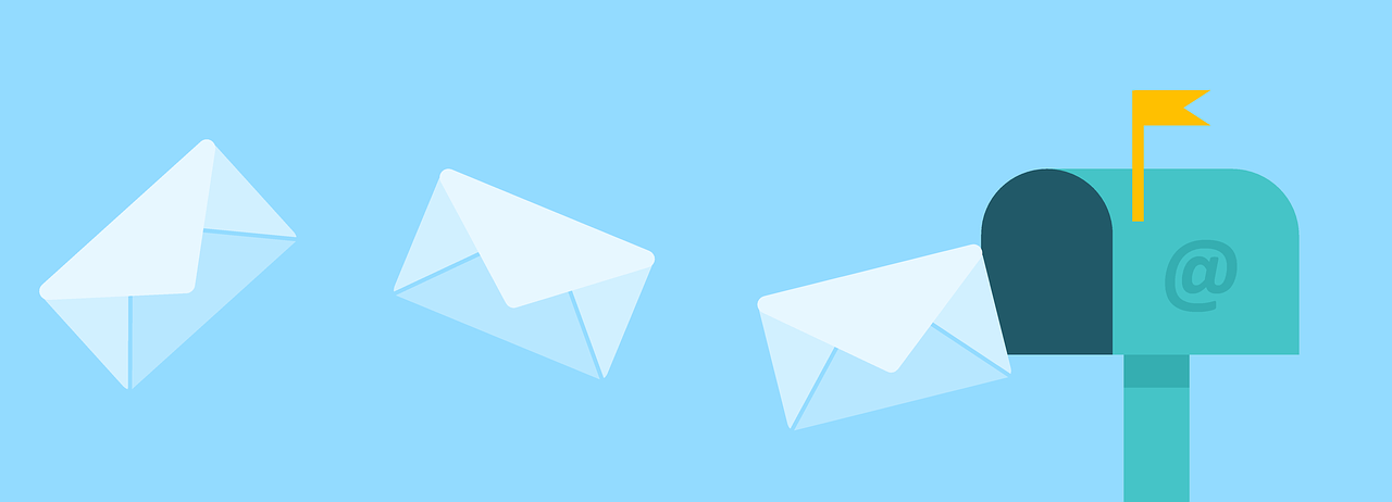 Envelopes representing emails flying into a mailbox