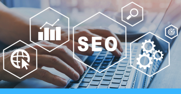 Person typing at keyboard with SEO lettering and various icons in foreground