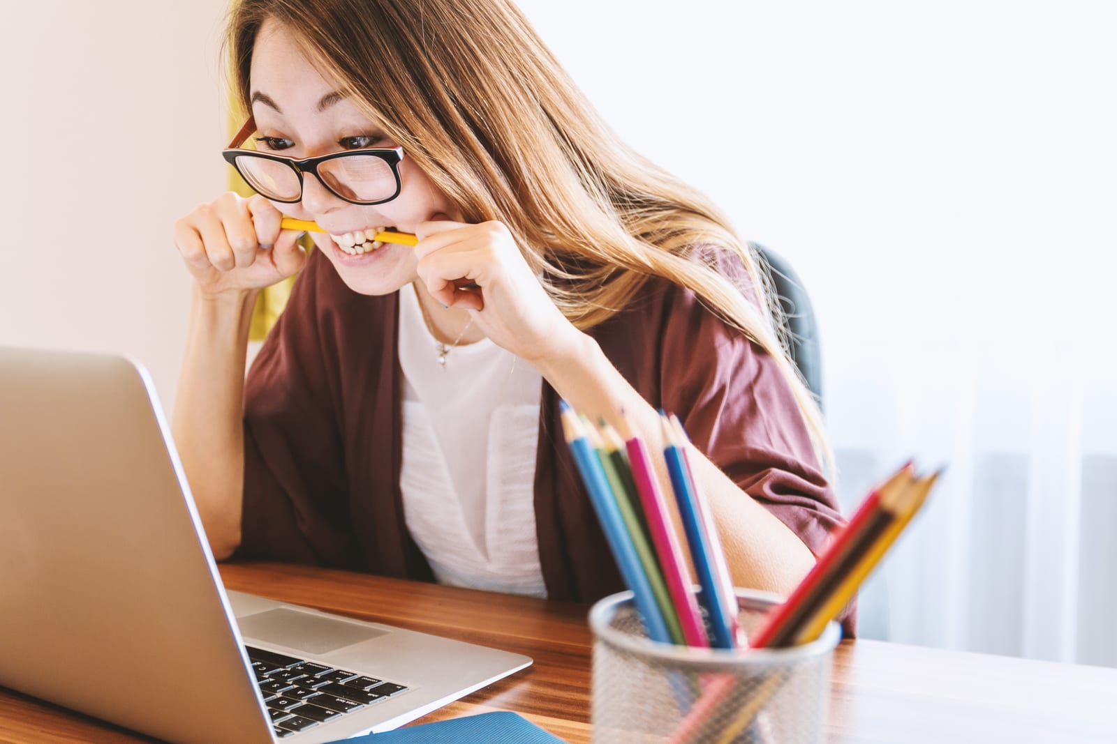 Woman stressed working at desk